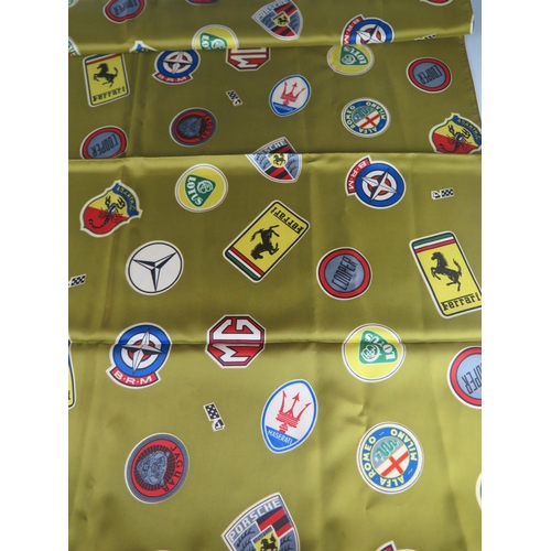 1426 - Les Leston, a printed silk scarf, with motor manufacturers badges, includes Ferrari, Lotus, Porsche,... 