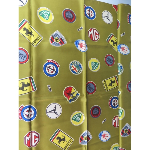 1426 - Les Leston, a printed silk scarf, with motor manufacturers badges, includes Ferrari, Lotus, Porsche,... 