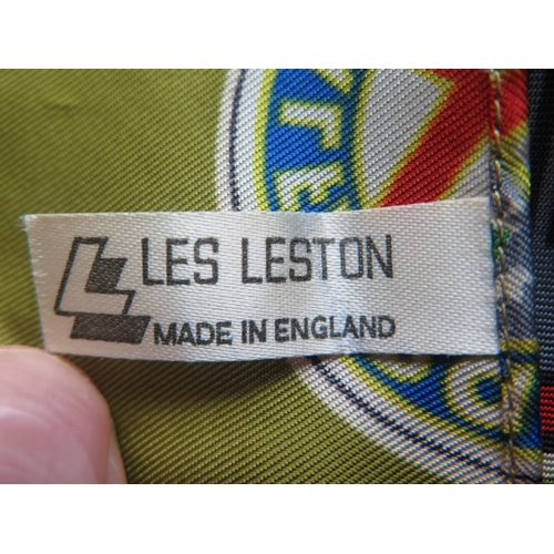 1426 - Les Leston, a printed silk scarf, with motor manufacturers badges, includes Ferrari, Lotus, Porsche,... 