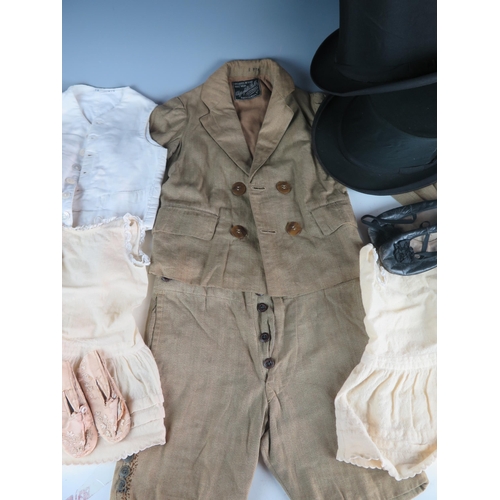 1430 - A young boys two-piece suit with double breasted jacket and shorts, a boys white corduroy waistcoat,... 