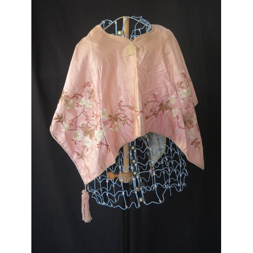 1442 - A Chinese pink shawl with embroidered floral and butterfly decoration with pale blue lining, togethe... 