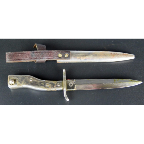 1458 - A German Demag Combination trench knife/bayonet, with 15cm double-edged blade with steel shaped grip... 