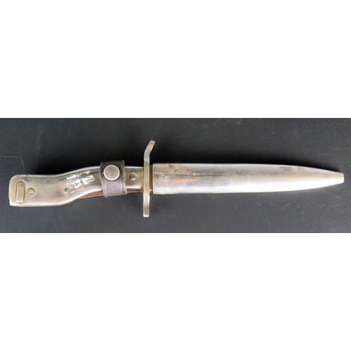 1458 - A German Demag Combination trench knife/bayonet, with 15cm double-edged blade with steel shaped grip... 