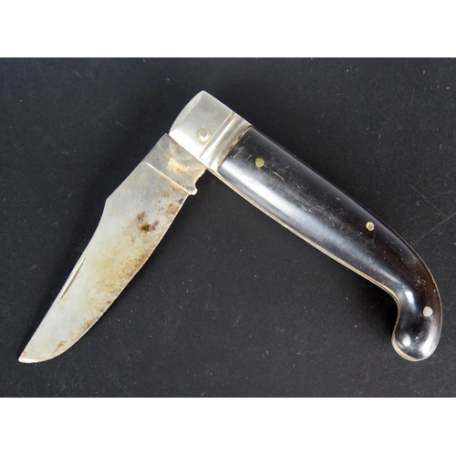 1474 - A folding knife with 7cm blade, 19cm fully extended.