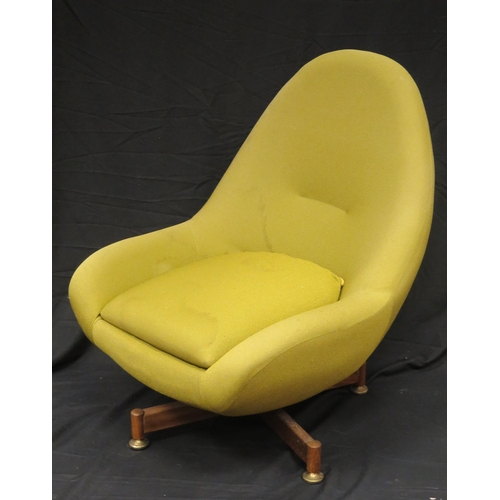 1571 - AV Greaves & Thomas egg swivel chair, with pale yellow loose cover on an X-frame base.