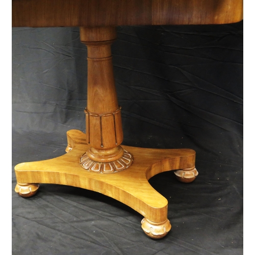 1572 - A Victorian mahogany folding card table, the hinged top with baize lining, raised on a turned column... 