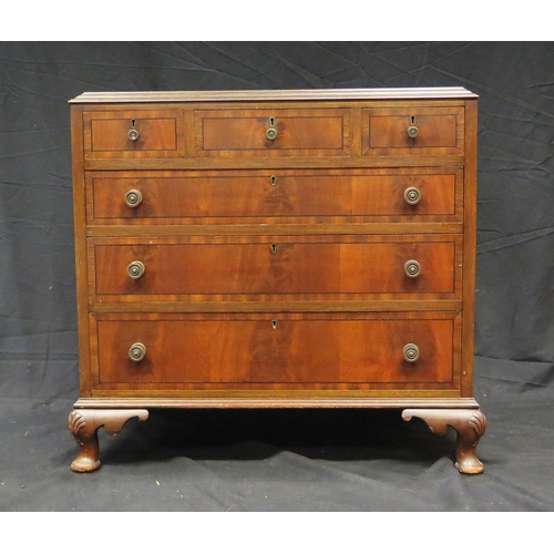 1575 - A reproduction mahogany chest, the rectangular top with a moulded edge above an arrangement of three... 