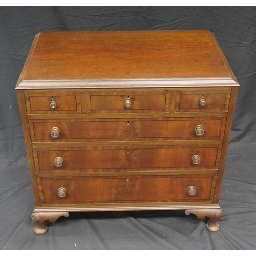 1575 - A reproduction mahogany chest, the rectangular top with a moulded edge above an arrangement of three... 