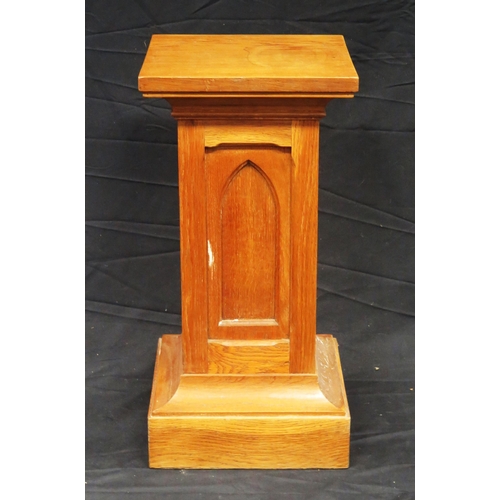 1584 - A mahogany torchere stand with fluted square tapering column on a stepped square base, 137cm high, t... 