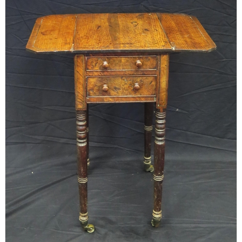 1587 - A 19th century oak side table, the top with two hinged leaves, and two short drawers, raised on ring... 