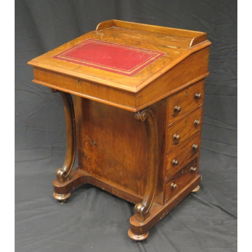 1590 - A Victorian rosewood davenport, the sloping hinged fall with inset tooled leather writing surface, w... 