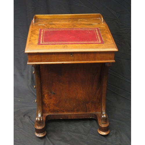 1590 - A Victorian rosewood davenport, the sloping hinged fall with inset tooled leather writing surface, w... 