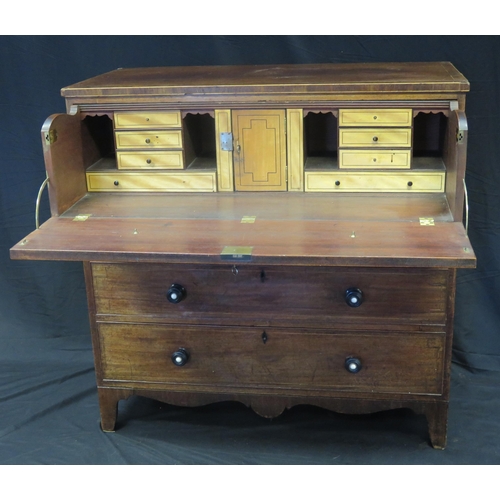 1599 - A late Georgian mahogany, boxwood and ebony strung secretaire chest, the rectangular crossbanded top... 