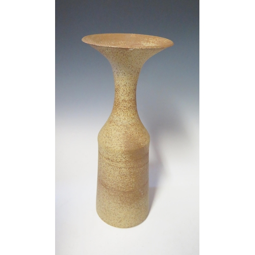 1116 - Stoneware vase with elongated flared neck, speckled brown matt glaze, makers mark on base, height 45... 