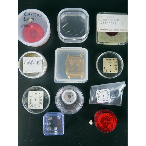 429 - A Selection of Cartier Watch Parts including dials, crowns, gold plated watch case (no. 96053086), h... 