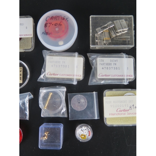 429 - A Selection of Cartier Watch Parts including dials, crowns, gold plated watch case (no. 96053086), h... 