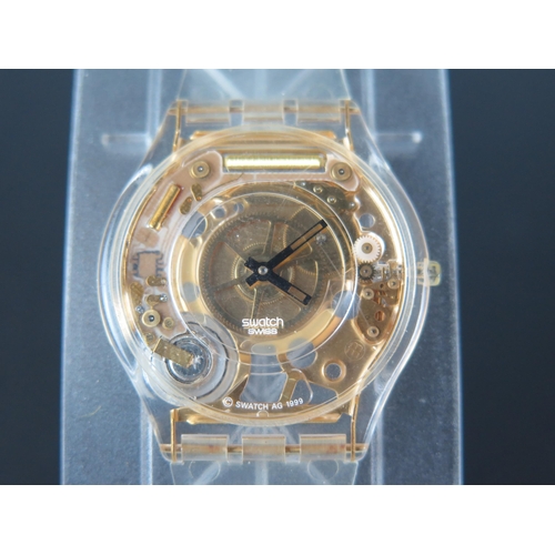 431 - A SWATCH Watch Golden Jelly Skin SFK101. Boxed and appears unworn