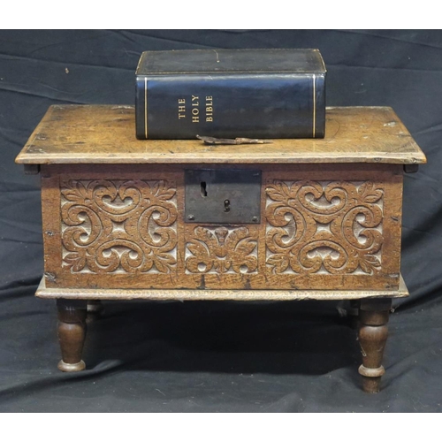 1624 - A Georgian oak bible box of rectangular outline, with hinged lid, foliated carved front panel, raise... 