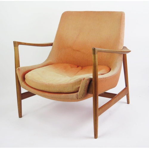 IB KOFOD LARSEN, Teak Easy Chair Model 4346 designed in 1956 and produced by Fritz Hansen and marked MADE IN DENMARK to the stretcher, 1950's/60's. 
Provenance: Lots 1001-1057 _ from the estate of a retired gentleman who lived in Sidmouth. In his professional life he was an architect with a major global airline, and the former mayor of a country town, with a keen interest in art and design