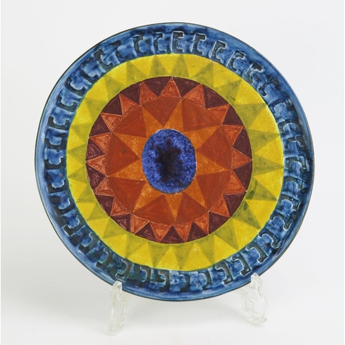 1004 - A Rare (possibly unique) and Early Troika Pottery Sun Plate or Wall Plaque decorated with blue, oran... 