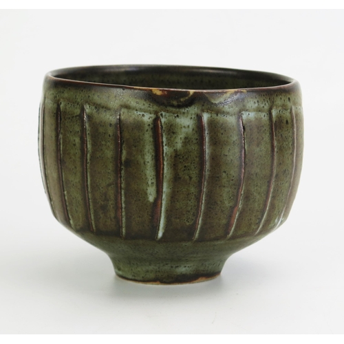 1006 - DAVID LEACH (1911-2005) for Lowerdown Pottery; a fluted porcelain bowl covered in green/grey breakin... 