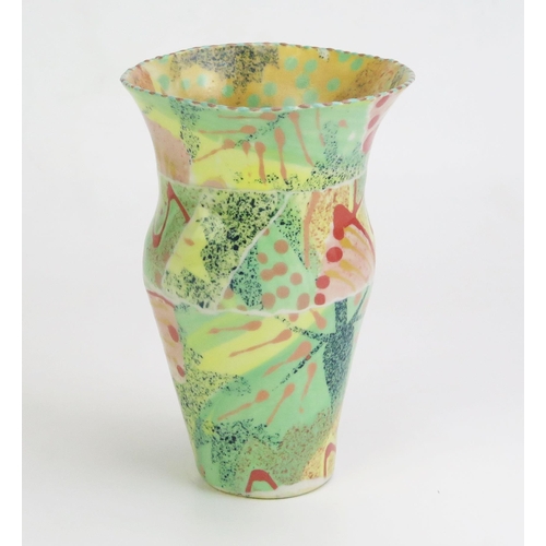 1017 - Mary Vigor (born 1947) Porcelain Uneven Vase decorated in a polychrome slip, signed to base, 18.5cm ... 