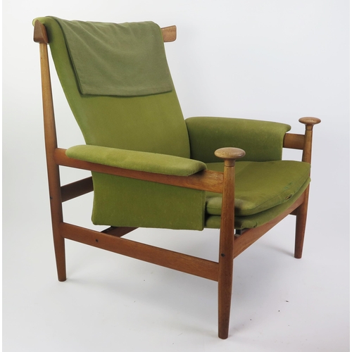 1027 - A Finn Juhl 152 'Bwana' Danish Teak Lounge Chair with Matching Foot Stool designed for French & Sons... 