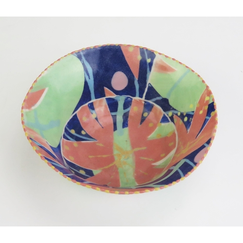 1034 - MARY VIGOR (born 1947) Porcelain Uneven Bowl decorated in a polychrome slip, signed to base, 16.5cm ... 