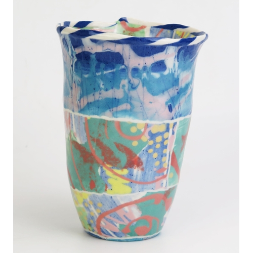 1036 - Mary Vigor (born 1947) Porcelain Uneven Vase decorated in a polychrome slip, signed to base, 20cm ta... 