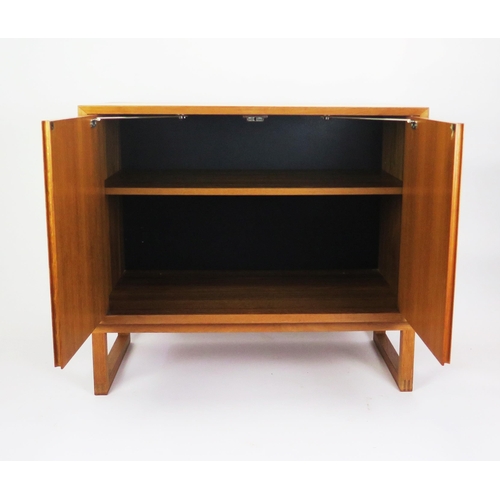 1052 - A 1960's Danish Teak Two Door Cabinet with single adjustable shelf, stamped MADE IN DENMARK, 80(l)x4... 