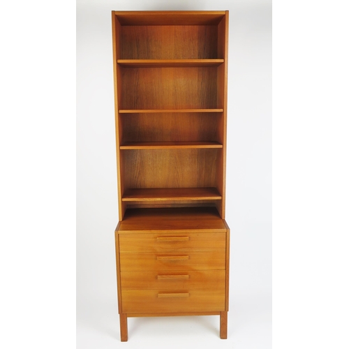 1053 - A Troeds Danish Teak Open Bookcase on Four Drawer Chest raised on four legs, stamped to the base, 19... 