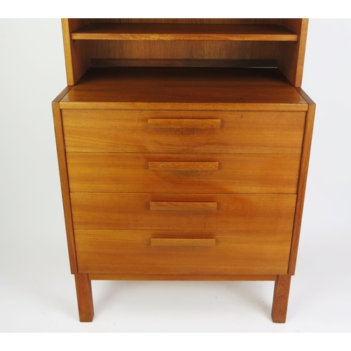 1053 - A Troeds Danish Teak Open Bookcase on Four Drawer Chest raised on four legs, stamped to the base, 19... 