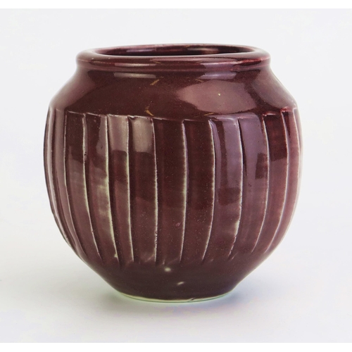 1057 - DAVID LEACH (1911-2005) for Lowerdown Pottery fluted vase, sang de boeuf glaze, impressed DL mark to... 