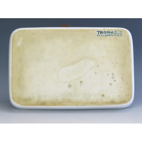 1058 - A Rare and Early Troika Pottery Dish of rectangular form with dark blue scarab decoration and rim, 