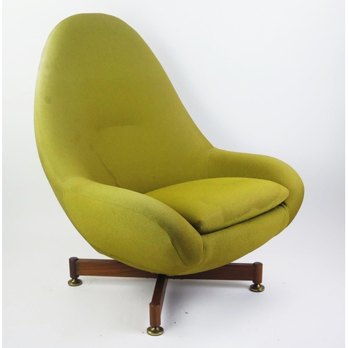 1075 - AV Greaves & Thomas egg swivel chair, with pale yellow loose cover on an X-frame base.