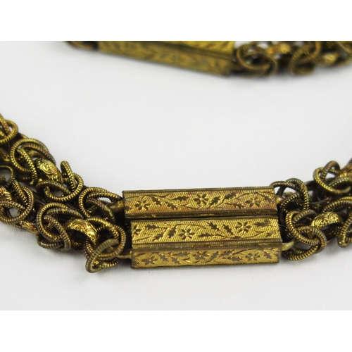 109 - A Georgian Gilt Metal Fancy Link Guard Chain with ornate barrel clasp, 48