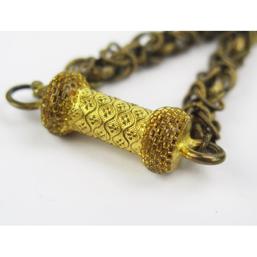 109 - A Georgian Gilt Metal Fancy Link Guard Chain with ornate barrel clasp, 48