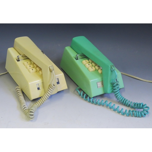 1090 - A British Telecom model 1/766 push-button trim phone in yellow ochre, with plug in lead, circa 1976/... 