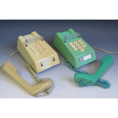 1090 - A British Telecom model 1/766 push-button trim phone in yellow ochre, with plug in lead, circa 1976/... 