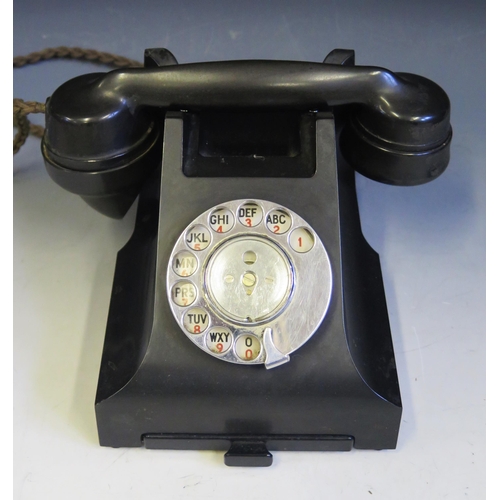 1093 - A GPO Model 332L telephone handset, in black Bakelite with sliding drawer to the base, circa 1950's ... 