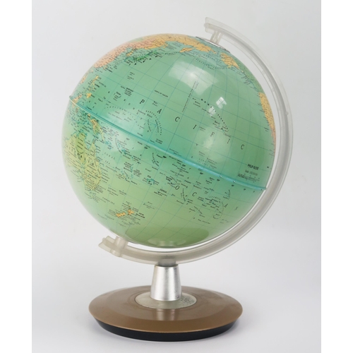 1107 - A 1970's Phillips plastic 8ins terrestrial  globe, on a circular plastic stand, 28cm high.