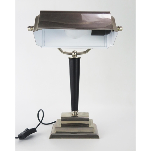 1108 - An Art Deco Style polished chrome and leatherette banker's lamp, with swivel shade on a tapering col... 