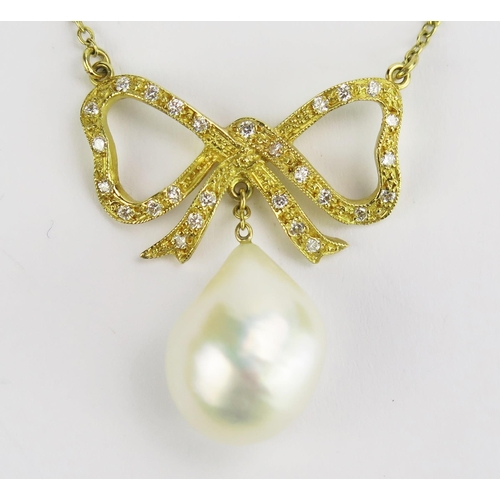 111 - An 18ct Gold, and Baroque Pearl or Cultured Pearl Necklace suspended beneath a diamond set bow and o... 