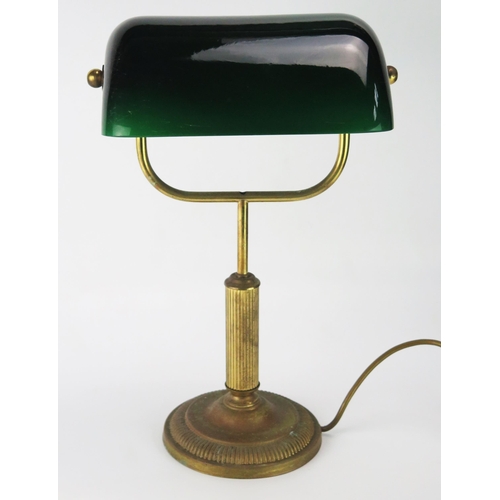 1110 - An anodised metal banker's table lamp with green glass shade on a reeded column and circular weighte... 