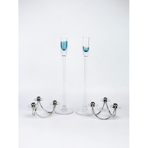 1117 - A pair of Danish stainless steel three light candlesticks, together with a pair of Scandinavian glas... 