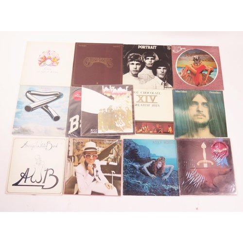 1124 - A collection of assorted 33 and 45rpm records, artists include Led Zeppelin, 10cc, Mike Oldfield, Ho... 