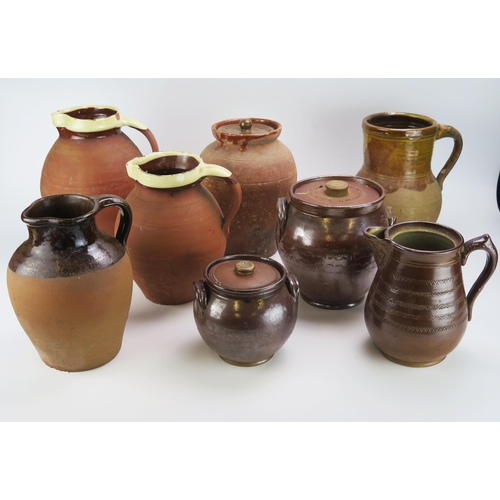 1134 - Two Brannam pottery graduated jugs, a salt glaze coffee pot (lacks lid); together with five other st... 