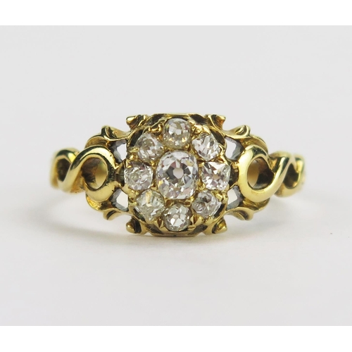 114 - A Georgian Old Cut Diamond Cluster Ring in a pierced precious yellow metal setting, c. 3.25mm princi... 