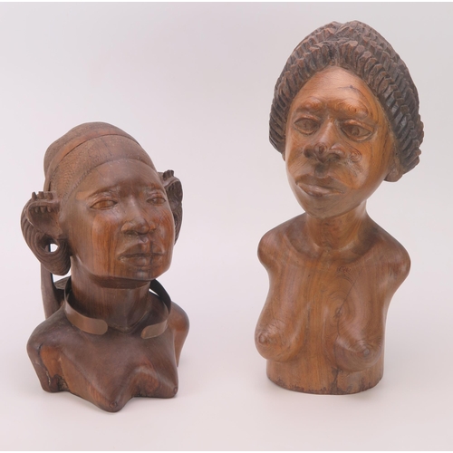 1171 - An African carved hardwood bust of a female, 28cm high together with another similar bust 37cm high.... 