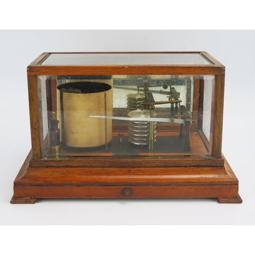 1183 - Yeates & Son, Dublin, an oak cased barograph, with seven tier vacuum and single recording arm, with ... 